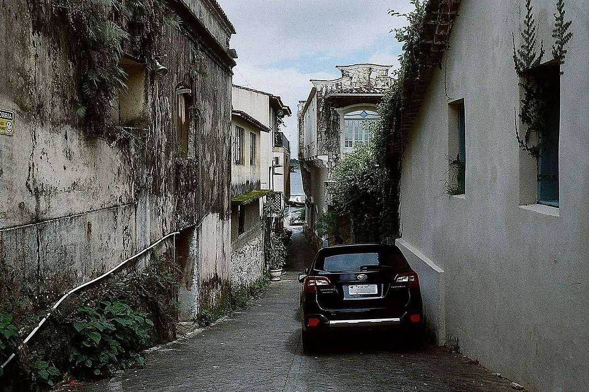 Stone Town street with cars, Zanzibar